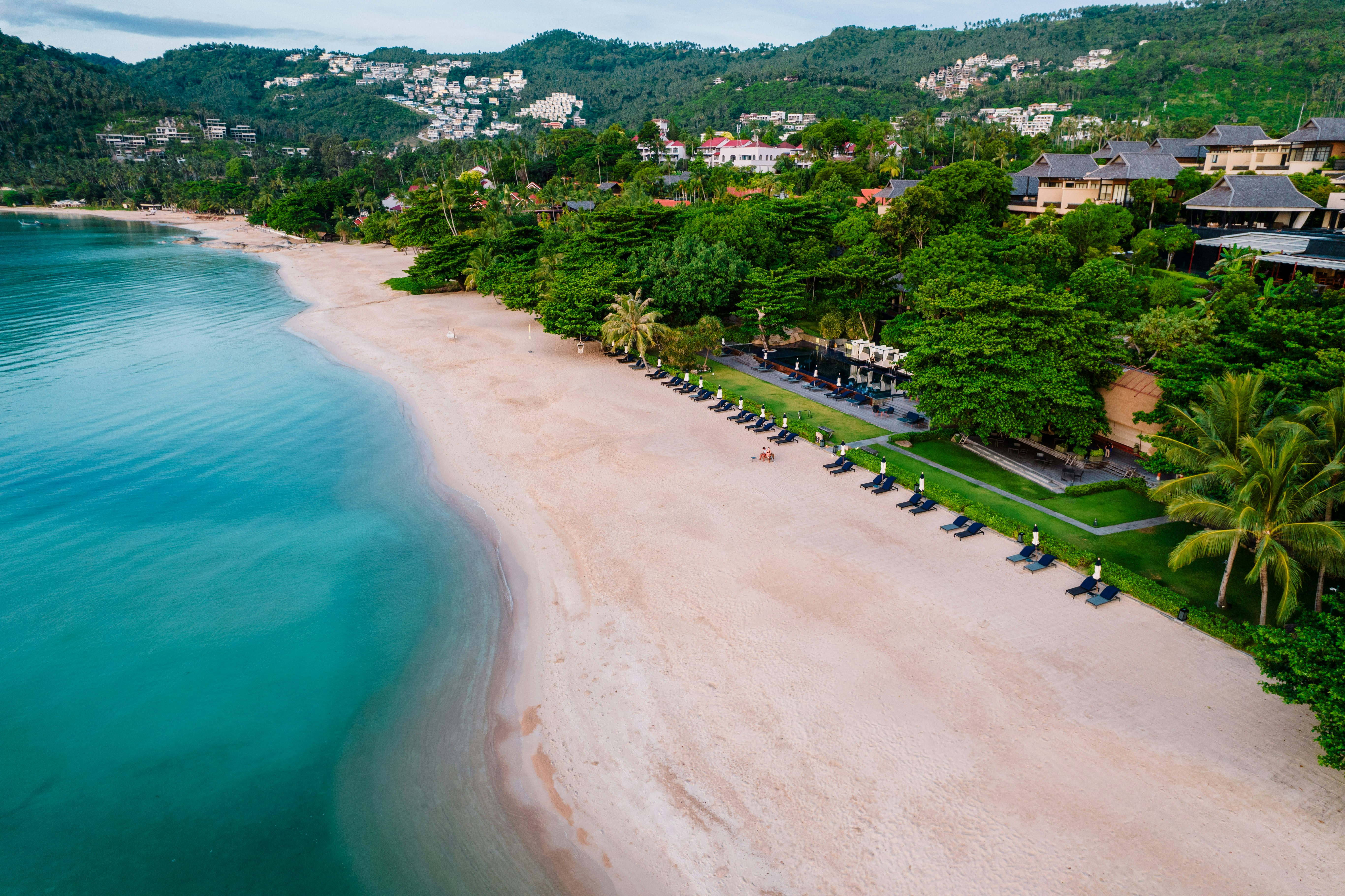 A bird's eye view of a beach and resort
